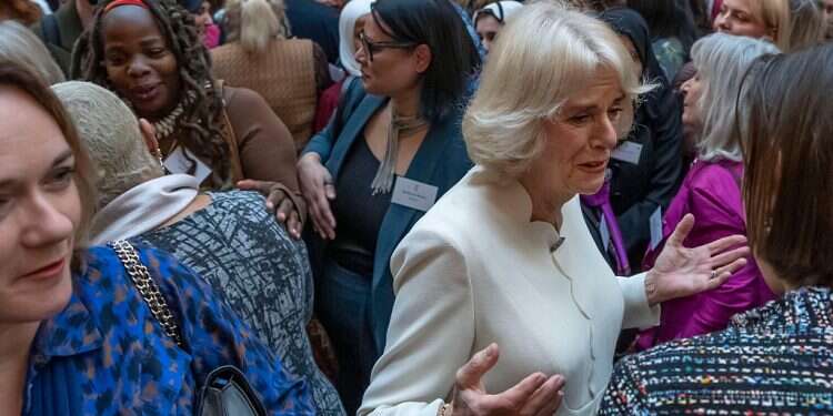 Ngozi Fulani, centre left, attends a reception held by Britain's Camilla, the Queen Consort, in Buckingham Palace, in London, Nov. 29, 2022 British royal aide steps down after racist comments