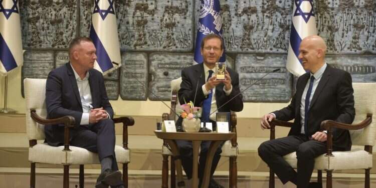 President of Israel Isaac Herzog (center) with CEO of Masa Israel Journey Ofer Gutman and Chairman of Masa's Board of Directors Josh Schwartz Speaking to Masa fellows, Herzog urges 'curiosity of what it means to be Jewish'