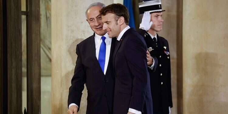 Netanyahu visits France amid spike in Mideast tensions