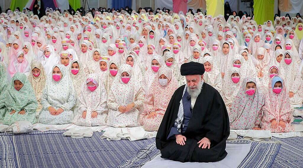 Supreme Leader Ayatollah Ali Khamenei leading prayer with Iranian girls on February 3, 2023 Mystery in Iran amid rampant girls school poisoning