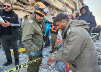 Israeli rescuers pull survivors from rubble after complex on-site amputation