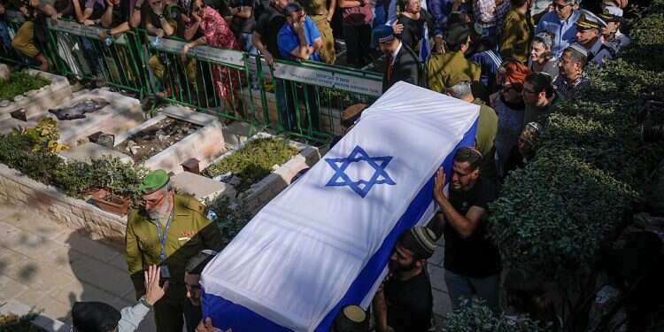 Mourners carry the flag-draped coffins of Hillel and Yagel Yaniv during their funeral at Israel's national cemetery in Jerusalem, Feb. 27, 2023 EU nations condemn recent violence outbreak in West Bank