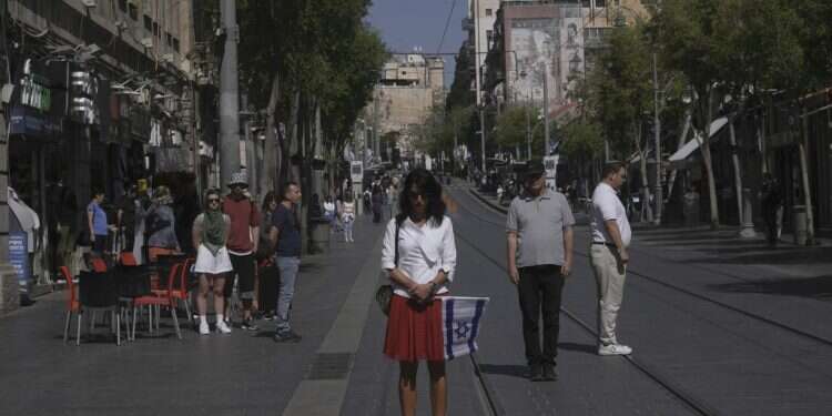 Israel stands still as sirens blare for Holocaust Remembrance Day