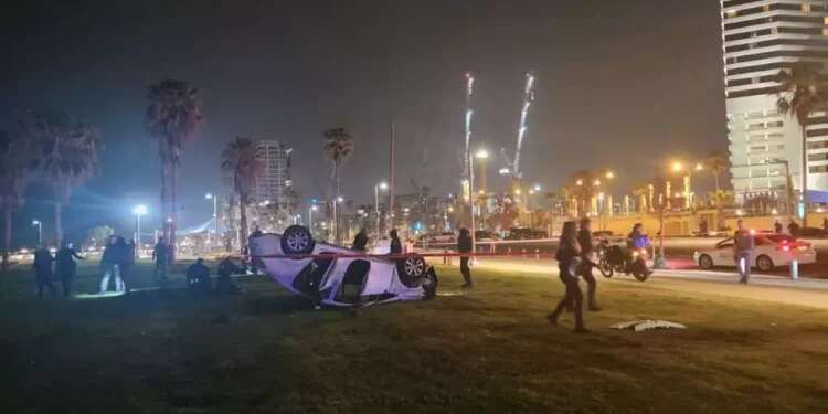 The site of the ramming attack in Tel Aviv on Friday. Pictured: The perpetrator's car Terrorist attack on Tel Aviv coast leaves 1 dead, several injured