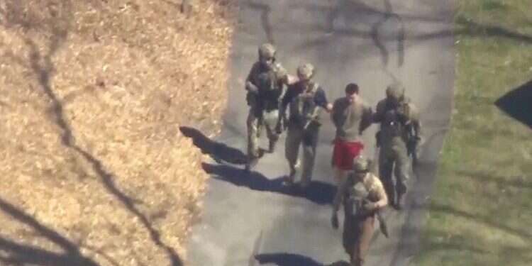 FBI agents arrest Jack Teixeira outside a residence in this still image taken from video in North Dighton, Massachusetts, April 13, 2023 Guardsman arrested in leak of classified US military documents