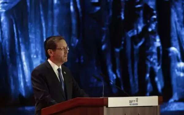 President urges divided nation to unite on Holocaust Remembrance Day