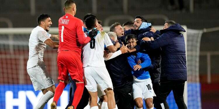 Israel's team celebrates winning 2-1 to Japan at the end of a FIFA U-20 World Cup Group C soccer match at the Malvinas Argentinas stadium in Mendoza, Argentina, Saturday, May 27, 2023 In dramatic win, Israel reaches round of 16 in U20 World Cup