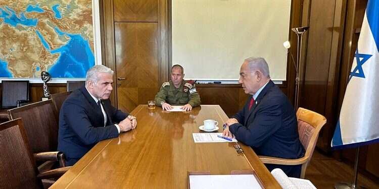 Opposition Leader Yair Lapid gets a briefing by Prime Minister Benjamin Netanyahu, May 10, 2023 PM warns terrorists Israel 'ready for the possibility of an expanded campaign'