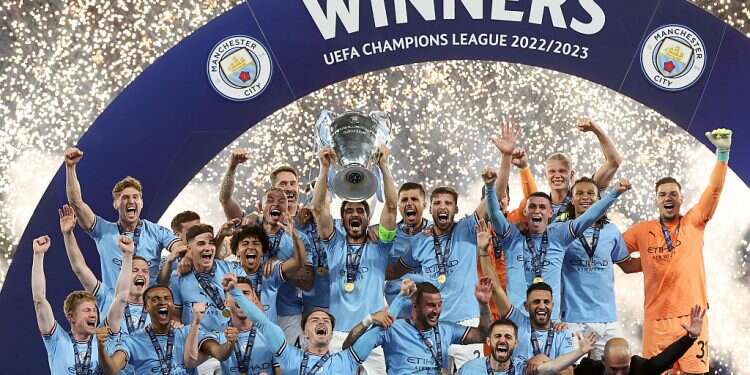 'We made history' Manchester City soccer team hail treble success