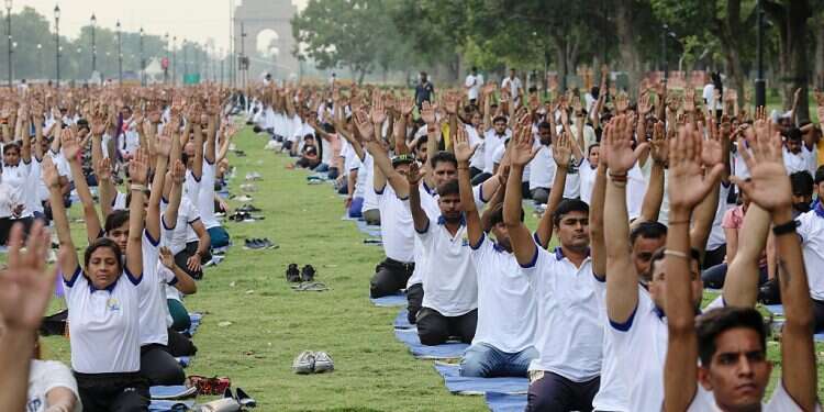 India's president starts US visit with yoga on UN lawn