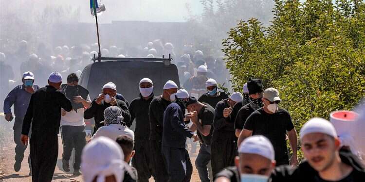 Druze protest against wind turbines construction turns violent