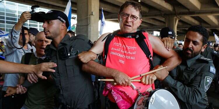 Anti-government protesters face off with police at Ben-Gurion International airport