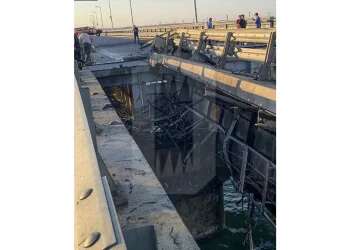 Traffic on key bridge from Crimea to Russia's mainland halted after attack that kills 2