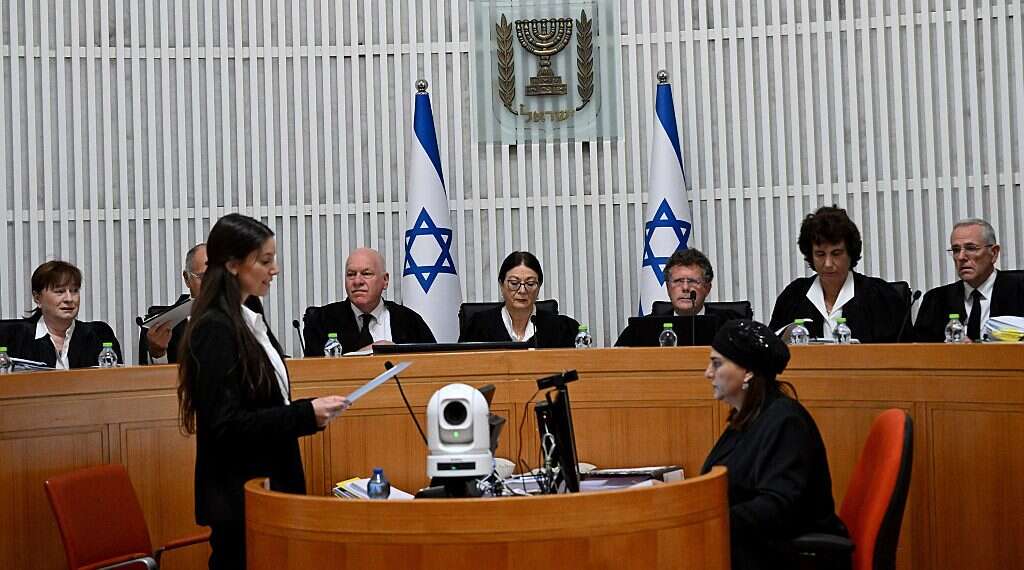 Esther Hayut, chief justice of the Supreme Court, center, sits on the bench with Israel's Supreme Court justices to look at the legality of Prime Minister Benjamin Netanyahu's contentious judicial overhaul on Sept. 12, 2023 Historic 15-justice panel convenes to hear arguments on judicial reform bill
