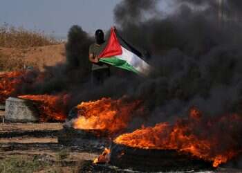 Israel reopens Gaza crossings, lets Palestinians workers in