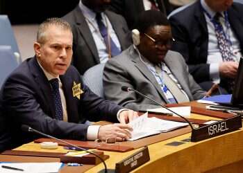 Erdan wears yellow Star of David 'until UN condemns Hamas atrocities'