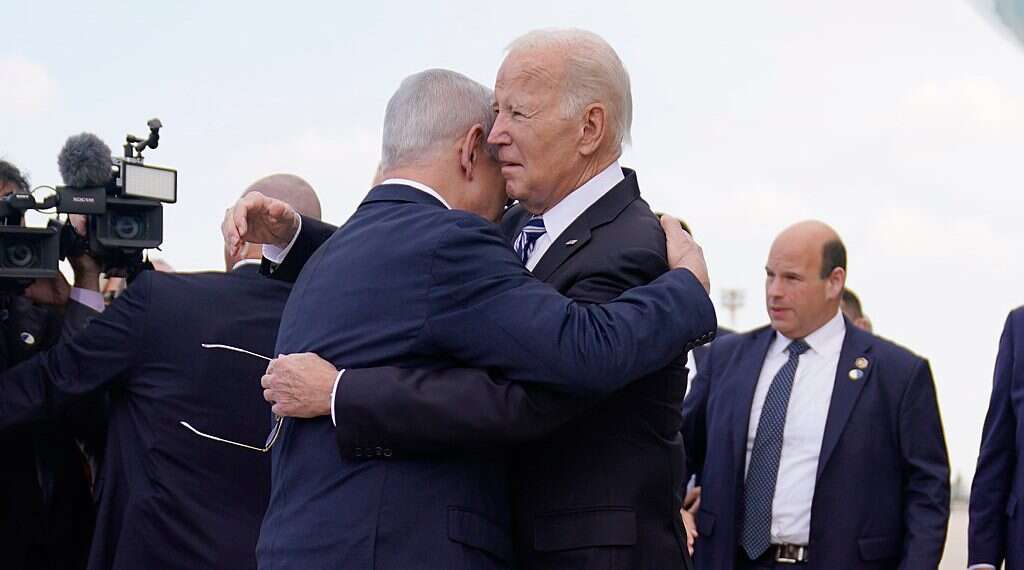 President Joe Biden is greeted by Israeli Prime Minister Benjamin Netanyahu after arriving at Ben Gurion International Airport, Wednesday, Oct. 18, 2023, in Tel Aviv THE LATEST: IDF ready for ground maneuver; intense airstrikes on Gaza overnight; more Hezbollah targets taken out