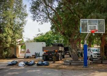 The smell of corpses sticks to your clothes: Forensics teams describe never-ending ordeal