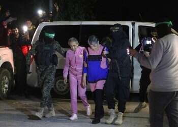 Hamas and Palestinian Islamic Jihad terrorists accompany newly released hostages before handing them over to the Red Cross in Rafah, in the southern Gaza Strip on November 28, 2023 These are the hostages that were released Tuesday: Here are their stories