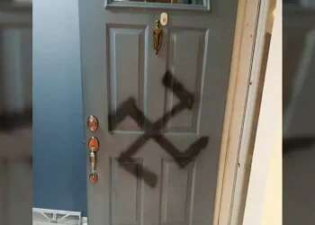 French police search for attacker after Lyon woman stabbed; swastika drawn