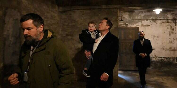 Elon Musk takes part in a private visit to Auschwitz-Birkenau with European Jewish Association (EJA) Chairman Rabbi Menachem Margolin, Ben Shapiro and Holocaust survivor Gidon Lev in Oswiecim, Poland January 22, 2024 Elon Musk visits Auschwitz, says he is 'aspirationally Jewish'