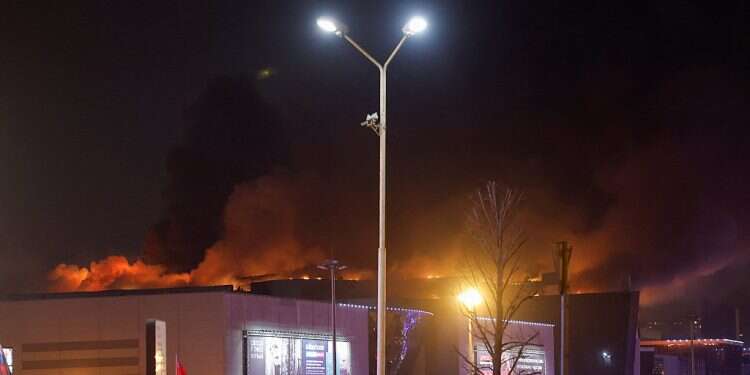 Scores killed after gunmen storm Moscow suburb's concert venue