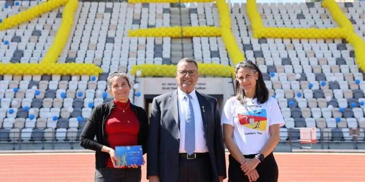 Lion with members of the Gaza periphery running team Jerusalem Winner Marathon 2024 shirt revealed