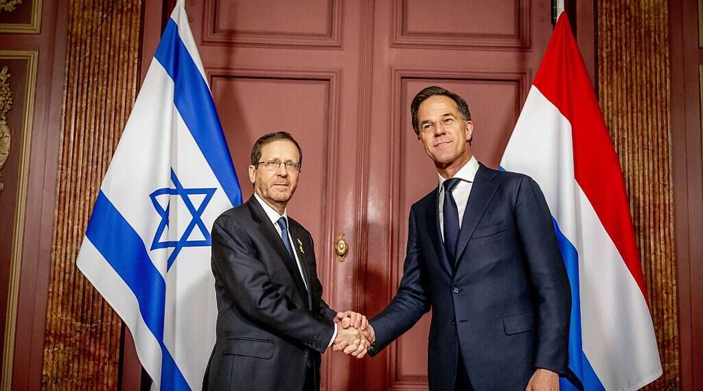 Dutch outgoing Prime Minister Mark Rutte (R) receives Israeli President Isaac Herzog at the Ministry of General Affairs in The Hague, the Netherlands, March 10, 2024 Herzog calls for peace at inauguration of Amsterdam Holocaust museum