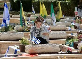 'I placed him on the grave so that he could be closest to his father'