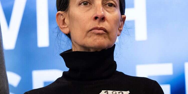 Rachel Goldberg-Polin wearing a sticker with the numeral 182, the number of days her son Hersch has been held in captivity, April 5, 2024, New York Mother of hostage held in Gaza makes Time's 100 Most Influential People list