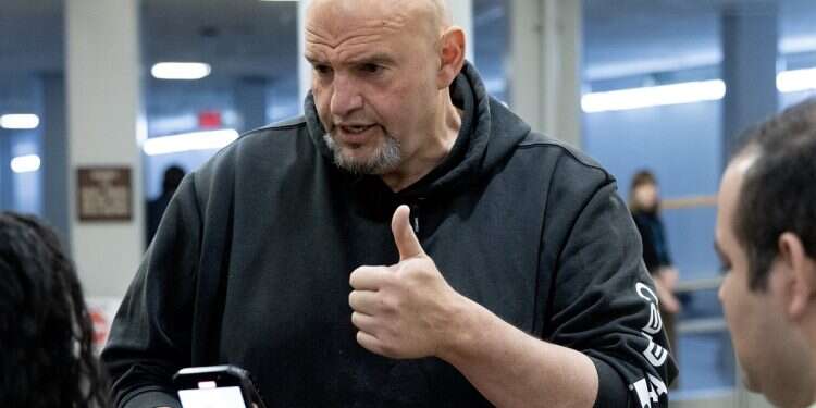Democratic Senator of Pennsylvania John Fetterman speaks to members of the news media at the Senate subway during a Senate procedural vote on the national security supplemental, on Capitol Hill in Washington, DC, April 23, 2024 Yeshiva University will award its highest honor to US Senator John Fetterman of Pennsylvania