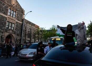 Pro-Palestinian protesters occupy a building where they had established an encampment at Fordham University Lincoln Center campus on May 1, 2024 Columbia moves final exams online as tensions boil over