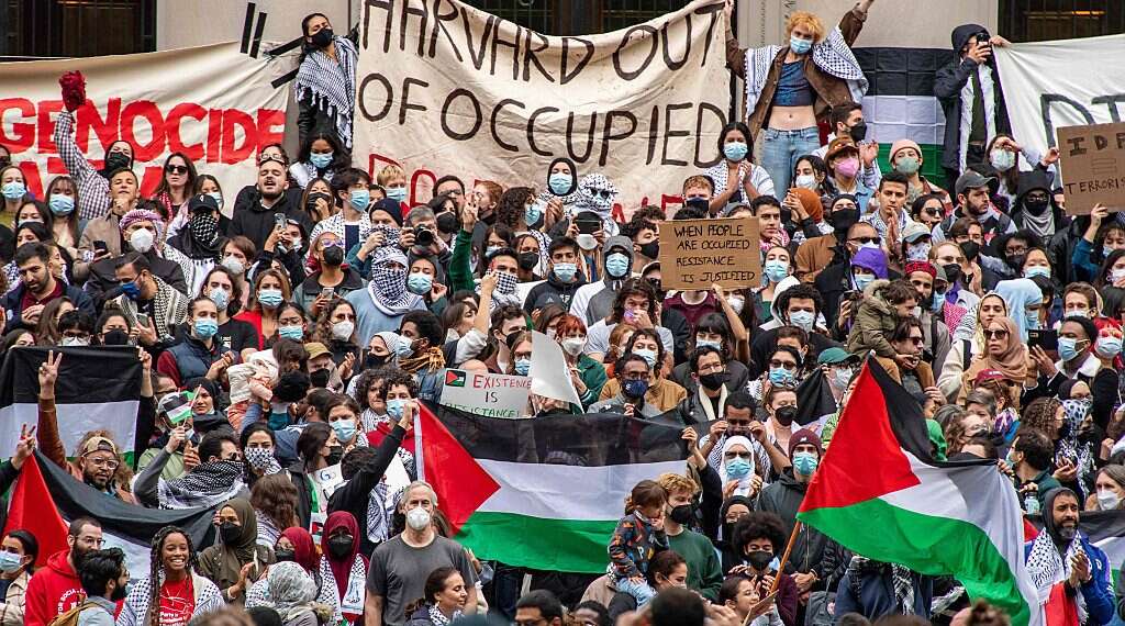 Gathering at Harvard University to support Palestinians in Gaza at a rally in Cambridge, Massachusetts, Oct. 14, 2023 Singing 'Hatikvah' in Harvard Palestinian stronghold, Jewish students fight back
