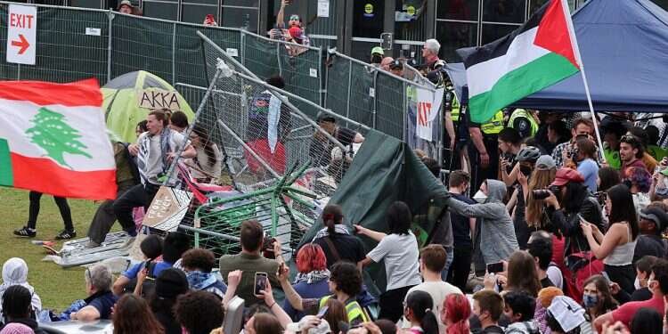 A protest encampment in support of Palestinians is re-occupied at MIT, in Cambridge, Massachusetts, on May 6, 2024. REUTERS/Brian Snyder
Clashes erupt as authorities raid MIT encampment hours before Israel independence event