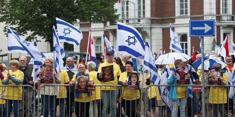 People demonstrate in support of Israel outside the International Court of Justice (ICJ) during a hearing where South Africa requests new emergency measures, May 17, 2024 World Court takes anti-Israel stance at The Hague, orders 'immediate halt to military offensive in Rafah'