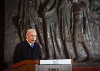 Netanyahu makes rare pledge in English at Holocaust Remembrance Day event