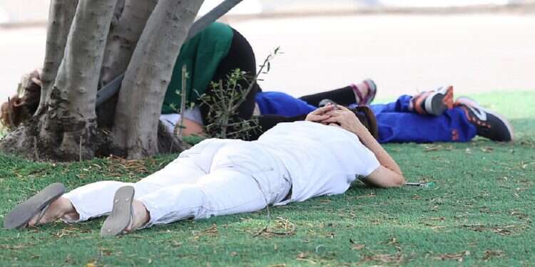 Israeli women lying on the ground due to a rocket attack on Tel-Aviv.
Oct. 27, 2023
A peek into the shelterless life of a 20-something Israeli woman