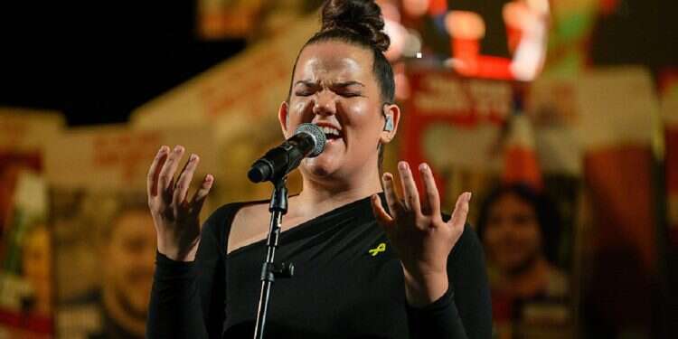 On a bed of tomatoes: Netta Barzilai sports a Spanish-inspired look