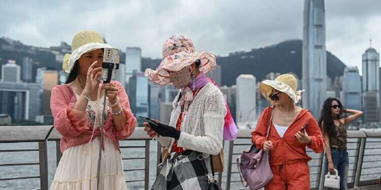 Hong Kong continues to struggle with attracting pre-pandemic levels of visitors Hong Kong tells residents: Smile