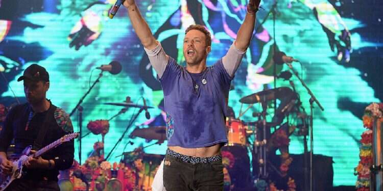 Chris Martin from Coldplay performs on stage during the Sentebale Concert at Kensington Palace on June 28, 2016 in London, England WATCH: Israeli hostages' solidarity tag displayed to thousands at Coldplay concert