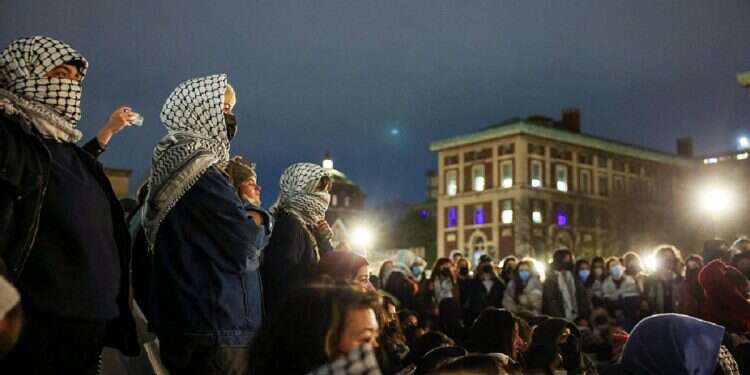 Students meet ahead of a midnight deadline set by Columbia President for student protesters to disband the protest encampment at Columbia University, New York City, US, April 23, 2024 Columbia agrees to campus safety measures after Jewish student's lawsuit