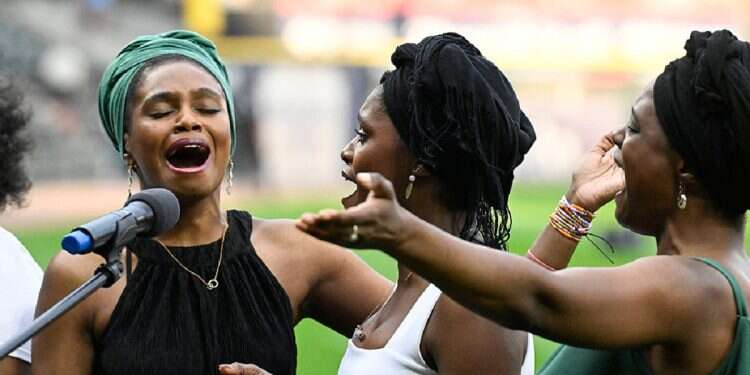Members of the Bournè family singing group perform the Black National Anthem in honor of Juneteenth Day before the game between the Houston Astros and the Chicago White Sox at Guaranteed Rate Field on Jun 19, 2024, in Chicago, Illinois, USA At least 15 shot in California Juneteenth celebration
