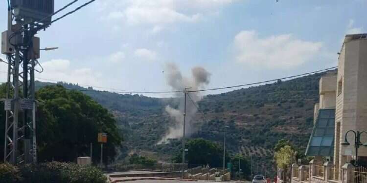 Massive Hezbollah salvo on northern Israel causes fires; 1 person injured