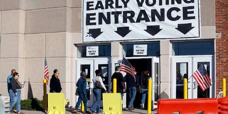 Voters wait in line to cast their ballot for early voting at the Franklin County Board of Elections, on the eve of the US midterm elections, in Columbus, Ohio, on November 7, 2022 Is it too late to replace Biden on ballot?