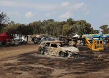 Burnt vehicles near the Nova party site. Photo: AFP Families of Oct. 7 victims sue Iran for $500M