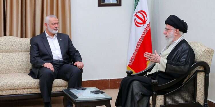Iran's Supreme Leader Ayatollah Ali Khamenei (R) meeting with Palestinian Hamas leader Ismail Haniyeh in Tehran on July 30, 2024 Khamenei convenes emergency meeting after Haniyeh assassination