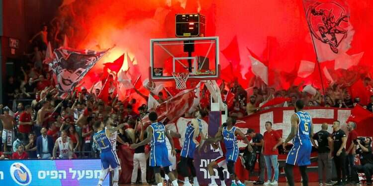 Torch-carrying Israelis at sporting events have posed challenges for medical professionals From battlefield to basketball court: The dual life of Israeli sports doctors