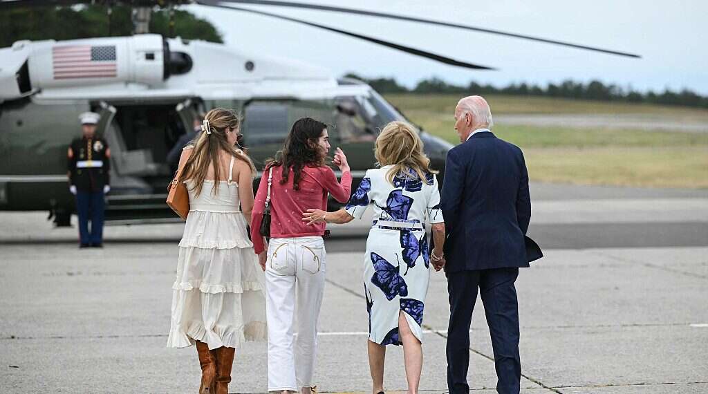 US President Joe Biden (R), First Lady Jill Biden and family walk to Marine One upon arrival at Francis S. Gabreski Airport in Westhampton Beach, New York, June 29, 2024 Biden's family urges him to keep fighting after debate setback