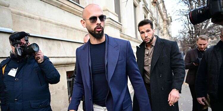 Andrew Tate (L) and Tristan Tate (R) walk from the Bucharest's Court of Appeal after a hearing about their demand to be allowed to leave Romania as their mother allegedly suffered a heart attack, in Bucharest, on December 22, 2023 Police raid Andrew Tate's Romanian home in child trafficking investigation