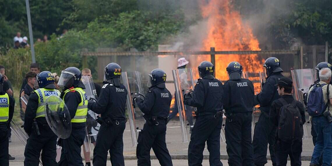 Far-right protesters storm, set ablaze migrant hotel in England